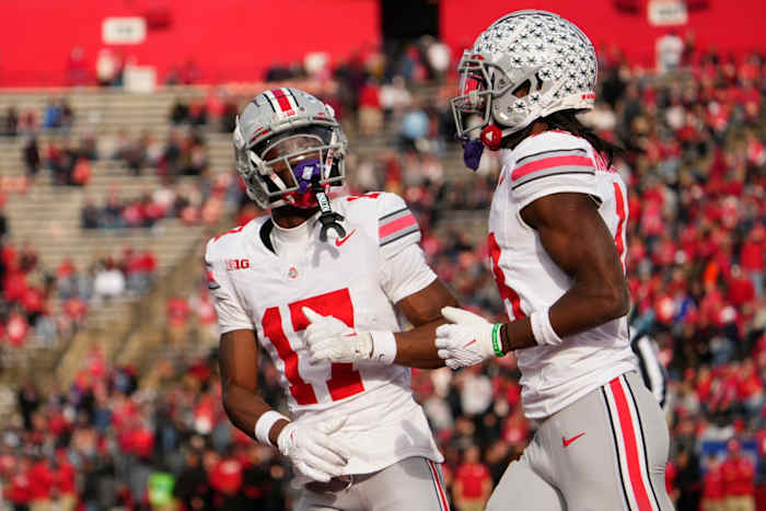 Nov 4, 2023; Piscataway, New Jersey, USA; Ohio State Buckeyes wide receiver Carnell Tate (17) congratulates wide receiver Marvin Harrison Jr. (18) after he scored a touchdown during the NCAA football game against the Rutgers Scarlet Knights 