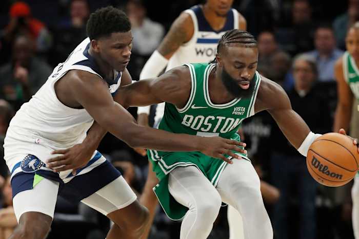 Nov 6, 2023; Minneapolis, Minnesota, USA; Minnesota Timberwolves forward Kyle Anderson (5) defends Boston Celtics forward Jaylen Brown (7) in the third quarter at Target Center.
