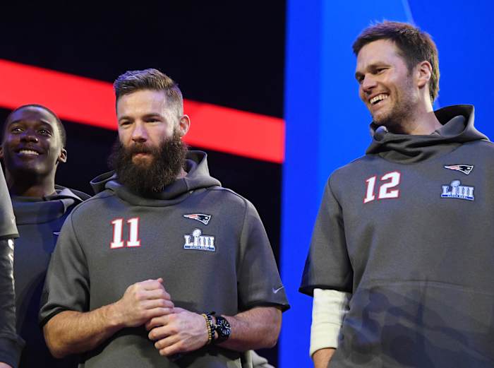 New England Patriots quarterback Tom Brady and wide receiver Julian Edelman during Opening Night for Super Bowl LIII at State Farm Arena.