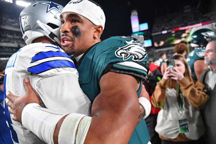 Dak Prescott and Jalen Hurts embrace after the Philadelphia Eagles defeated the Dallas Cowboys in Week 9.