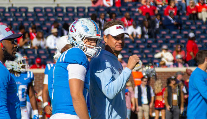 Ole Miss Lane Kiffin talking to Jaxson Dart at Vaught-Hemingway Stadium.