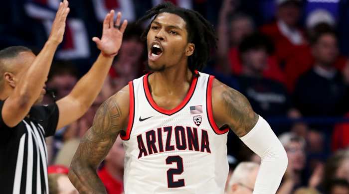 Arizona guard Caleb Love celebrates after a made three-pointer