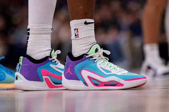 Jayson Tatum's blue and pink Jordan Brand sneakers.
