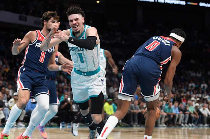 Charlotte Hornets guard LaMelo Ball (1) looses the ball to Washington Wizards guard Bilal Coulibaly (0) during the first half at the Spectrum Center.