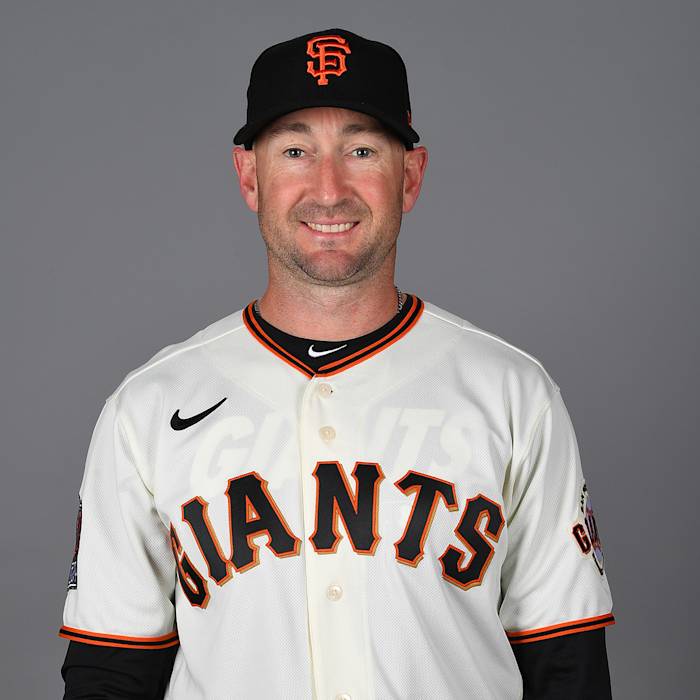 Feb 18, 2020; Scottsdale, Arizona, USA; San Francisco Giants catching coach Craig Albernaz (32) poses for a photo during spring training media day at Scottsdale Stadium.