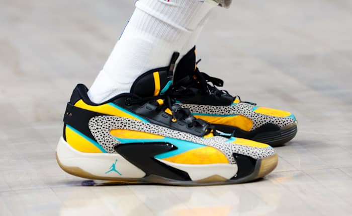 Dallas Mavericks guard Luka Doncic's black and yellow Jordan Brand sneakers.