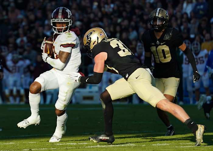 Nov 11, 2023; West Lafayette, Indiana, USA; Minnesota Golden Gophers wide receiver Daniel Jackson (9) catches a pass against Purdue Boilermakers defensive back Dillon Thieneman (31) during the first half at Ross-Ade Stadium.