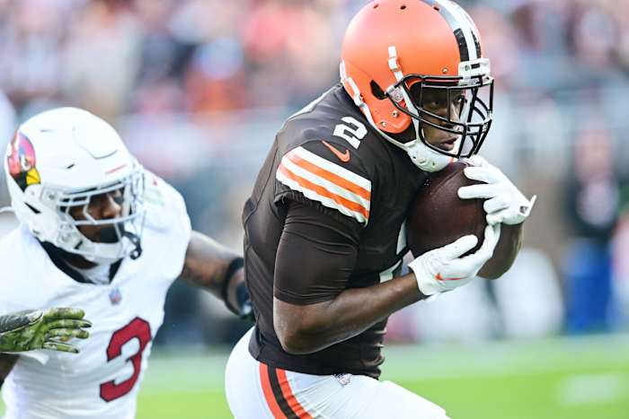 Nov 5, 2023; Cleveland, Ohio, USA; Cleveland Browns wide receiver Amari Cooper (2) runs with the ball after a catch as Arizona Cardinals safety Budda Baker (3) defends during the second half at Cleveland Browns Stadium.