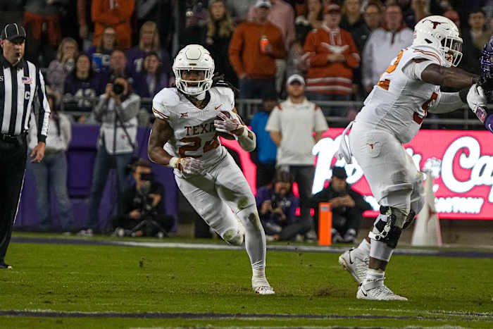 Texas Longhorns running back Jonathon Brooks (24) runs the ball against Texas Christian University at Amon G. Carter Stadium on Saturday, Nov. 11, 2023 in Fort Worth, Texas