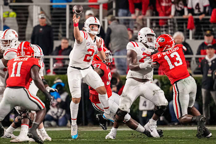 Nov 11, 2023; Athens, Georgia, USA; Mississippi Rebels quarterback Jaxson Dart (2) passes against the Georgia Bulldogs during the first quarter at Sanford Stadium. Mandatory Credit: Dale Zanine-USA TODAY Sports