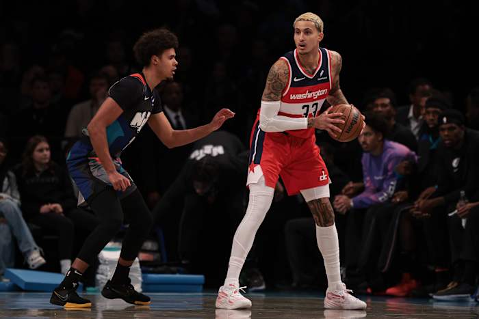 Washington Wizards forward Kyle Kuzma (33) is guarded by Brooklyn Nets forward Cameron Johnson (2) during the first quarter at Barclays Center.