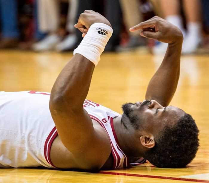 Indiana's Xavier Johnson (0) celebrates his basket and foul during the first half of the Indiana versus Army men's basketball game at Simon Skjodt Assembly Hall.