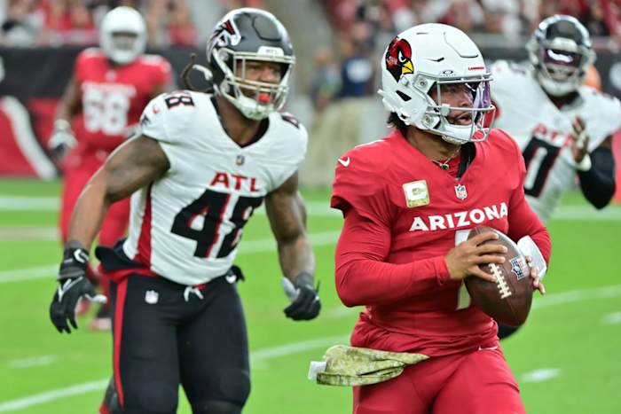 Nov 12, 2023; Glendale, Arizona, USA; Arizona Cardinals quarterback Kyler Murray (1) is chased by Atlanta Falcons linebacker Bud Dupree (48) in the first half at State Farm Stadium