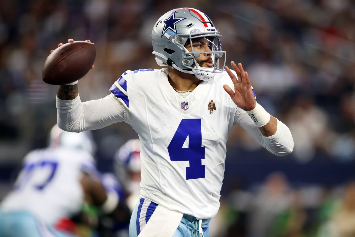 Nov 12, 2023; Arlington, Texas, USA; Dallas Cowboys quarterback Dak Prescott (4) throws a pass in the second quarter against the New York Giants at AT&T Stadium. Mandatory Credit: Tim Heitman-USA TODAY Sports