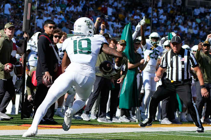 Nov 4, 2023; Waco, Texas, USA; Baylor Bears cornerback Caden Jenkins (19) makes an interception against the Houston Cougars during the first half at McLane Stadium. Mandatory Credit: Chris Jones-USA TODAY Sports