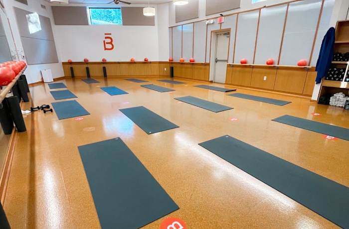 Inside of a Barre3 Studio with mats and equipment