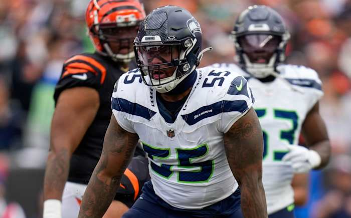 Seattle Seahawks defensive end Dre'Mont Jones (55) celebrates after sacking Cincinnati Bengals quarterback Joe Burrow (9) in the third quarter of the NFL Week 6 game between the Cincinnati Bengals and the Seattle Seahawks at Paycor Stadium in downtown Cincinnati on Sunday, Oct. 15, 2023.