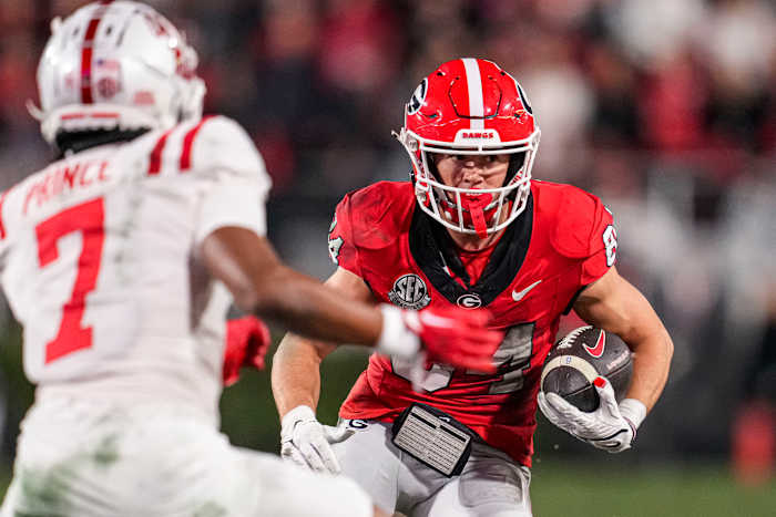 Georgia Bulldogs wide receiver Ladd McConkey (84) runs after a catch against the Mississippi Rebels during the first half at Sanford Stadium.