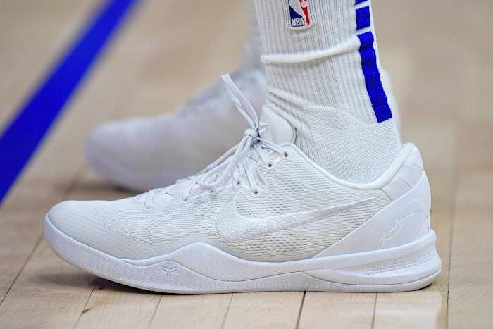 Side view of Kobe Bryant's white Nike sneakers.