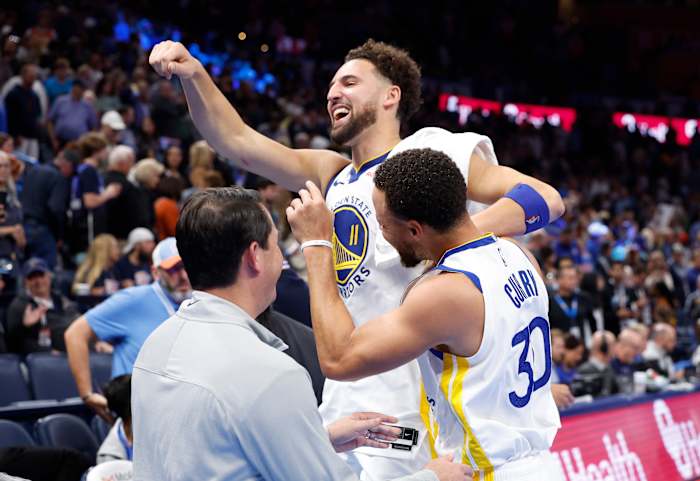 Nov 3, 2023; Oklahoma City, Oklahoma, USA; Golden State Warriors guard Klay Thompson (11) and guard Stephen Curry (30) celebrate after defeating the Oklahoma City Thunder at Paycom Center. Golden State won 141-139.