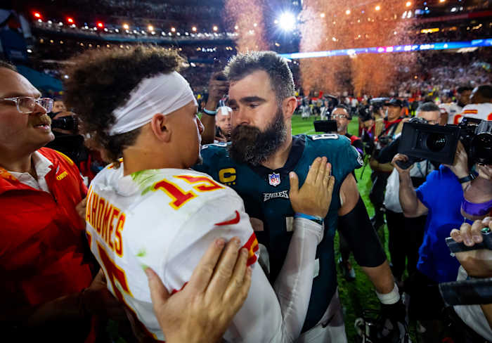 Kansas City Chiefs quarterback Patrick Mahomes (15) greets Philadelphia Eagles center Jason Kelce following Super Bowl LVII at State Farm Stadium.
