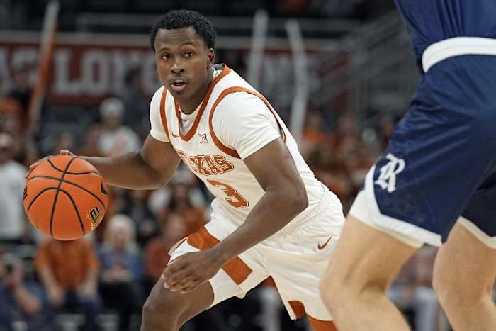 Texas Longhorns guard Max Abmas (3) looks to pass the ball during the first half against the Rice Owls at Moody Center.