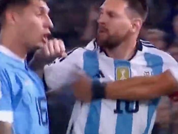 Lionel Messi pictured (right) striking Mathias Olivera during a game between Argentina and Uruguay in November 2023