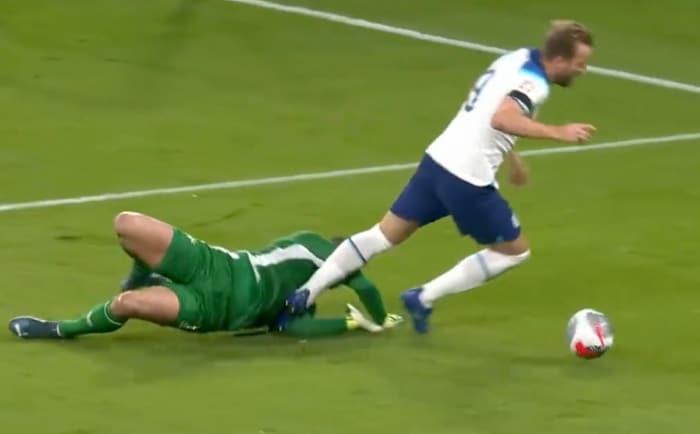 England captain Harry Kane pictured (right) falling to the ground after dribbling around Malta goalkeeper Henry Bonello during a Euro 2024 qualifier at Wembley in November 2023