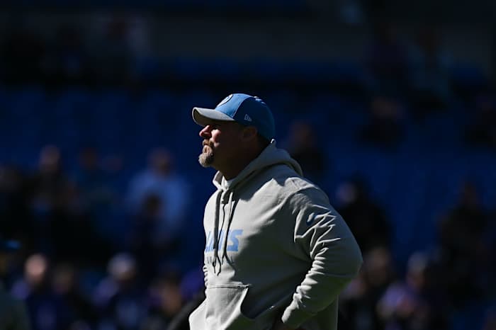 Detroit Lions head coach Dan Campbell stands on the field before the game against the Baltimore Ravens at M&T Bank Stadium.