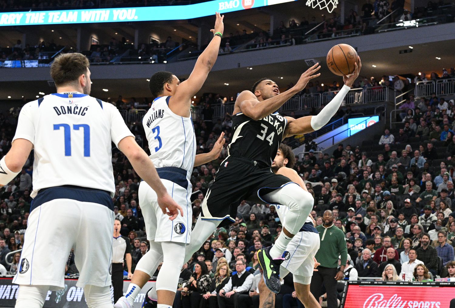 Milwaukee Bucks superstar Giannis Antetokounmpo gets to the rim against the Dallas Mavericks.
