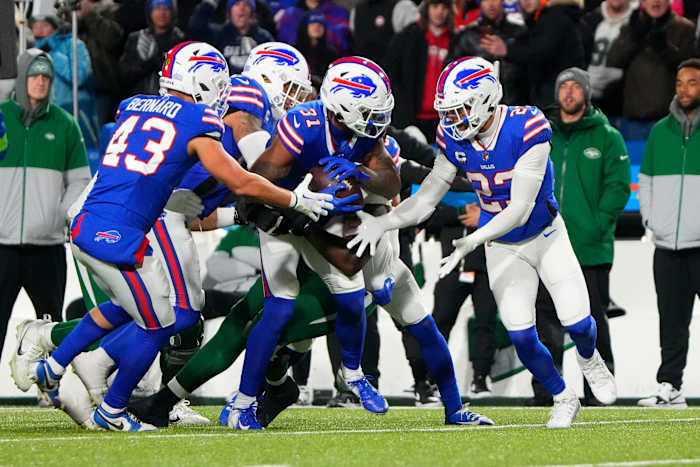 Buffalo Bills cornerback Rasul Douglas (31) recovers a fumble by New York Jets wide receiver Garrett Wilson (17) (not pictured) during the second half at Highmark Stadium.