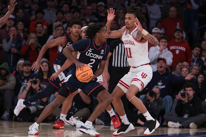 Connecticut Huskies guard Tristen Newton (2) dribbles as Indiana Hoosiers guard CJ Gunn (11) defends during the second half at Madison Square Garden.