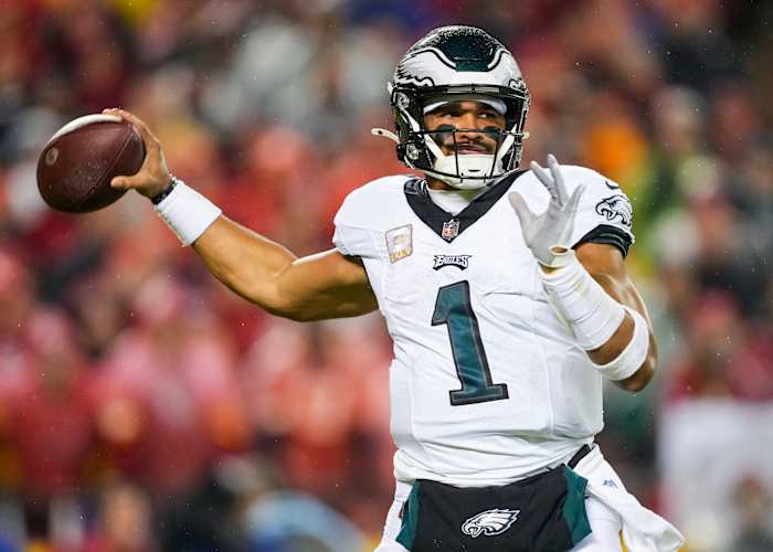Philadelphia Eagles quarterback Jalen Hurts (1) throws a pass during the first half against the Kansas City Chiefs at GEHA Field at Arrowhead Stadium.