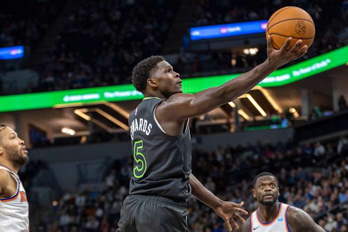 Nov 20, 2023; Minneapolis, Minnesota, USA; Minnesota Timberwolves guard Anthony Edwards (5) shoots against the New York Knicks in the second half at Target Center.