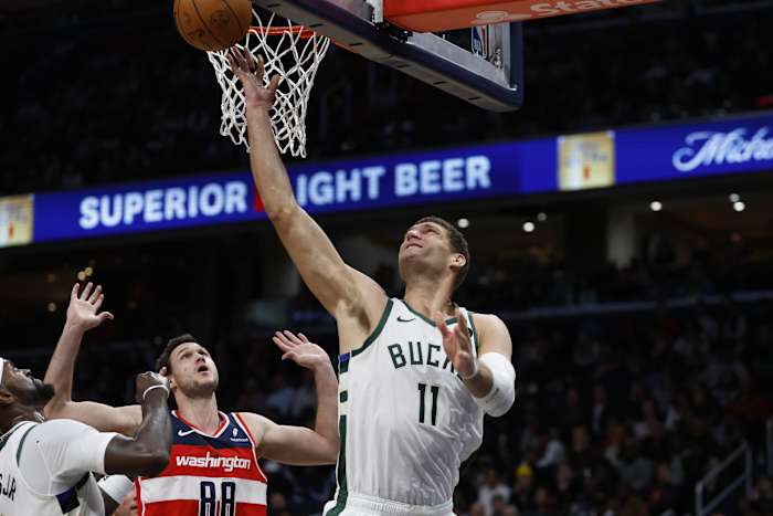 Milwaukee Bucks center Brook Lopez (11) shoots the ball as Washington Wizards forward Danilo Gallinari (88)