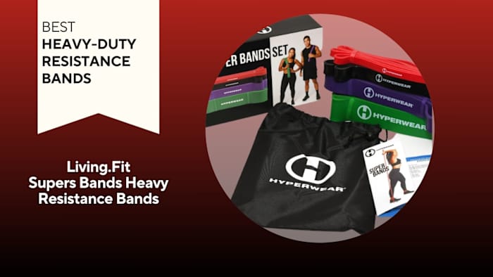 Photo of resistance bands against a red background