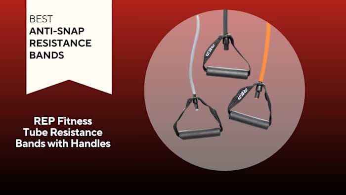 Photo of resistance bands against a red background