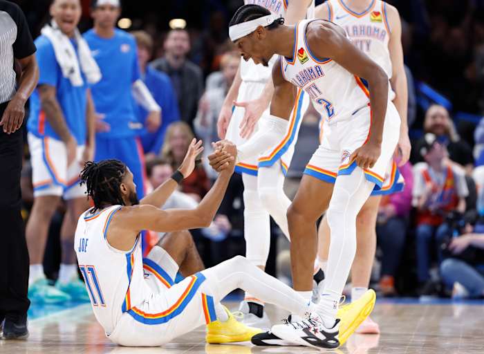 Nov 22, 2023; Oklahoma City, Oklahoma, USA; Oklahoma City Thunder guard Shai Gilgeous-Alexander (2) celebrates with guard Isaiah Joe (11) after scoring a three-point basket and gets the foul during the second half at Paycom Center. Mandatory Credit: