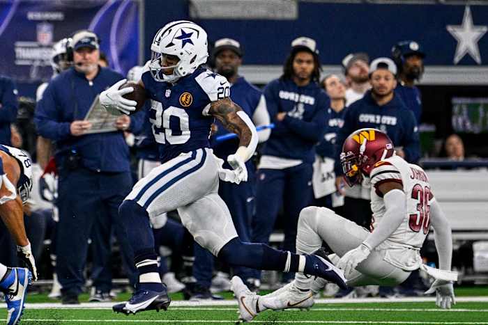 Pollard runs through the Commanders' defense during Thursday's game.