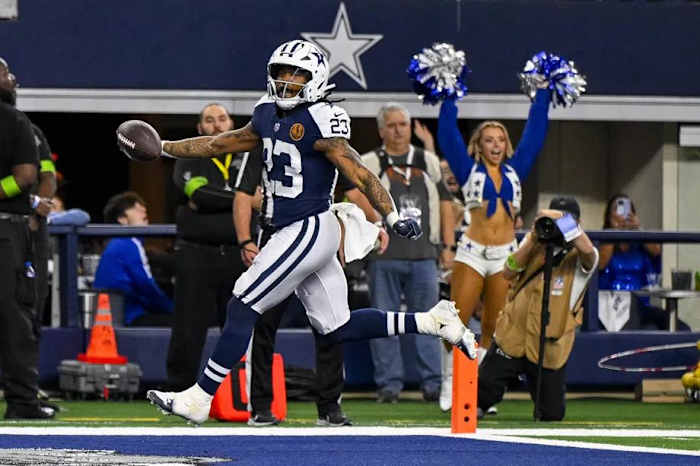Cowboys running back Rico Dowdle opened the scoring against the Commanders.