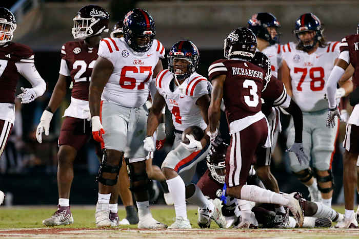 Ole Miss Rebels running back Quinshon Judkins celebrates a first down vs. the Mississippi State Bulldogs in the 2023 Egg Bowl.