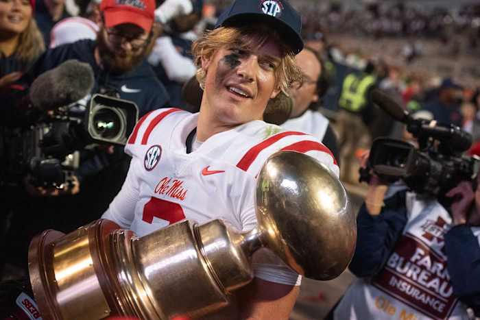 Ole Miss Rebels quarterback Jaxson Dart celebrates an Egg Bowl win