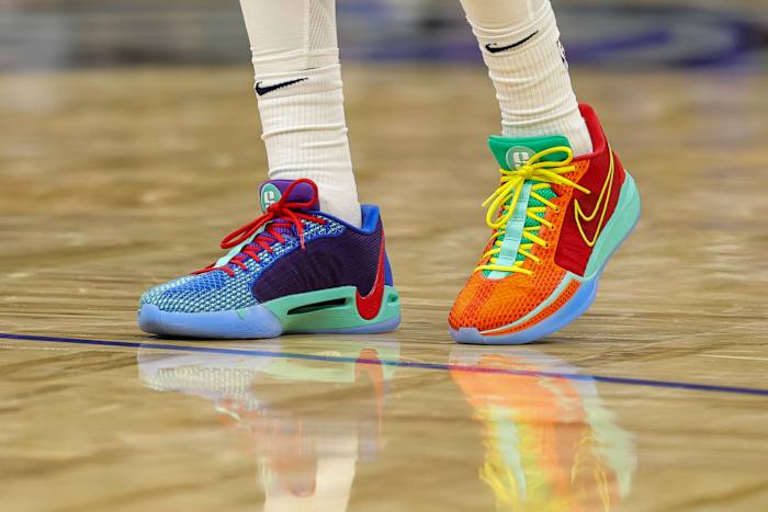 View of Sabrina Ionesci's multicolor Nike sneakers.