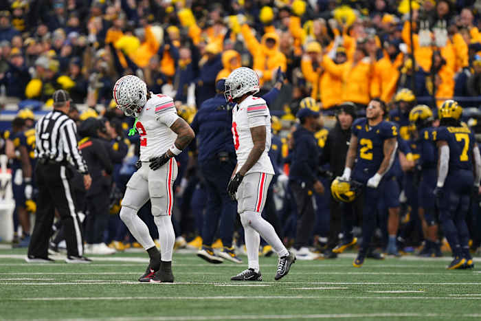 Ohio State players leave Michigan Stadium upset following a 30-24 loss to Michigan