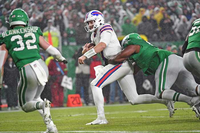 Allen being tackled by an Eagles defender in the loss.