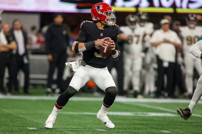 Atlanta Falcons quarterback Desmond Ridder drops back to pass against the New Orleans Saints on Nov. 26, 2023.