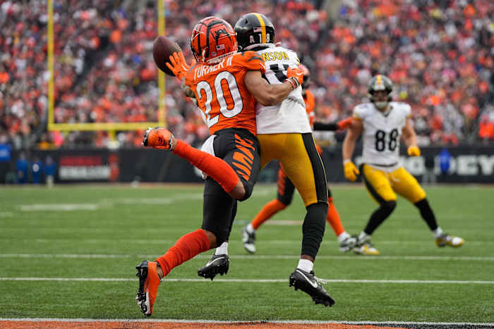 Cincinnati Bengals cornerback DJ Turner II (20) breaks up a pass at the goal line intended for Pittsburgh Steelers wide receiver Diontae Johnson (18) in the fourth quarter of the NFL Week 12 game between the Cincinnati Bengals and the Pittsburgh Steelers at Paycor Stadium in Cincinnati on Sunday, Nov. 26, 2023. The Steelers took a 16-10 win over the Bengals in Cincinnati.