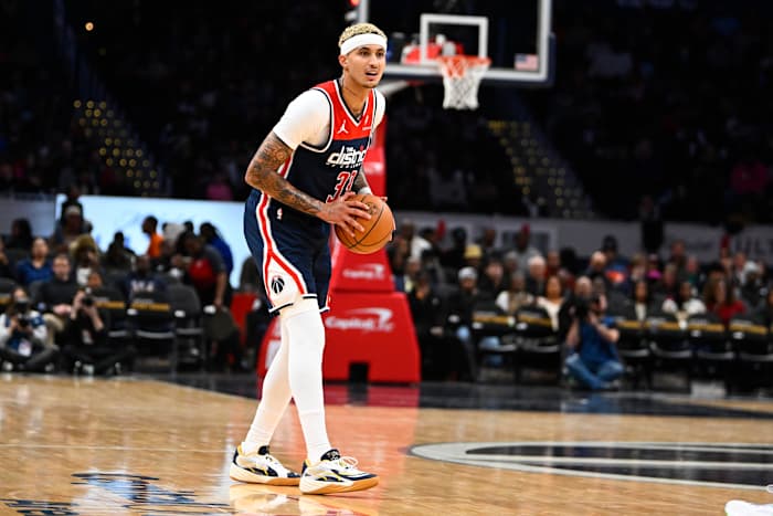 Washington Wizards forward Kyle Kuzma (33) looks on against the Atlanta Hawks during the second half at Capital One Arena. He recently found his way back to his hometown of Flint, MI to launch a jail reform program for women.