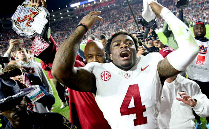 Alabama Crimson Tide quarterback Jalen Milroe celebrates a win over the Auburn Tigers.