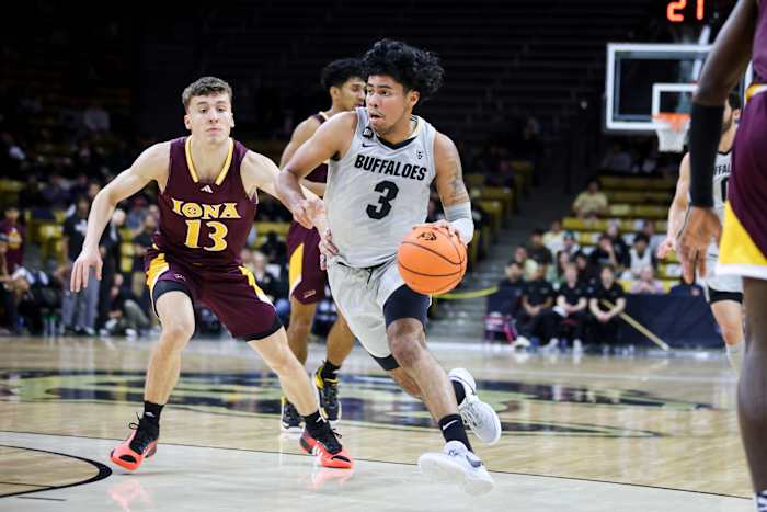 Colorado Buffaloes guard Julian Hammond III (3) drives past Iona Gaels guard Alex Bates IV (13) during the second half at CU Events Center